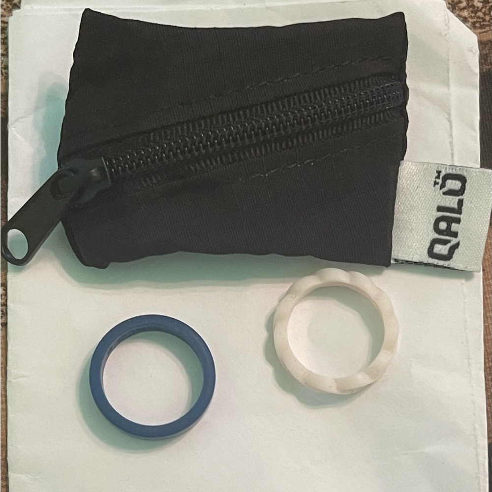 Qalo rings and storage bag